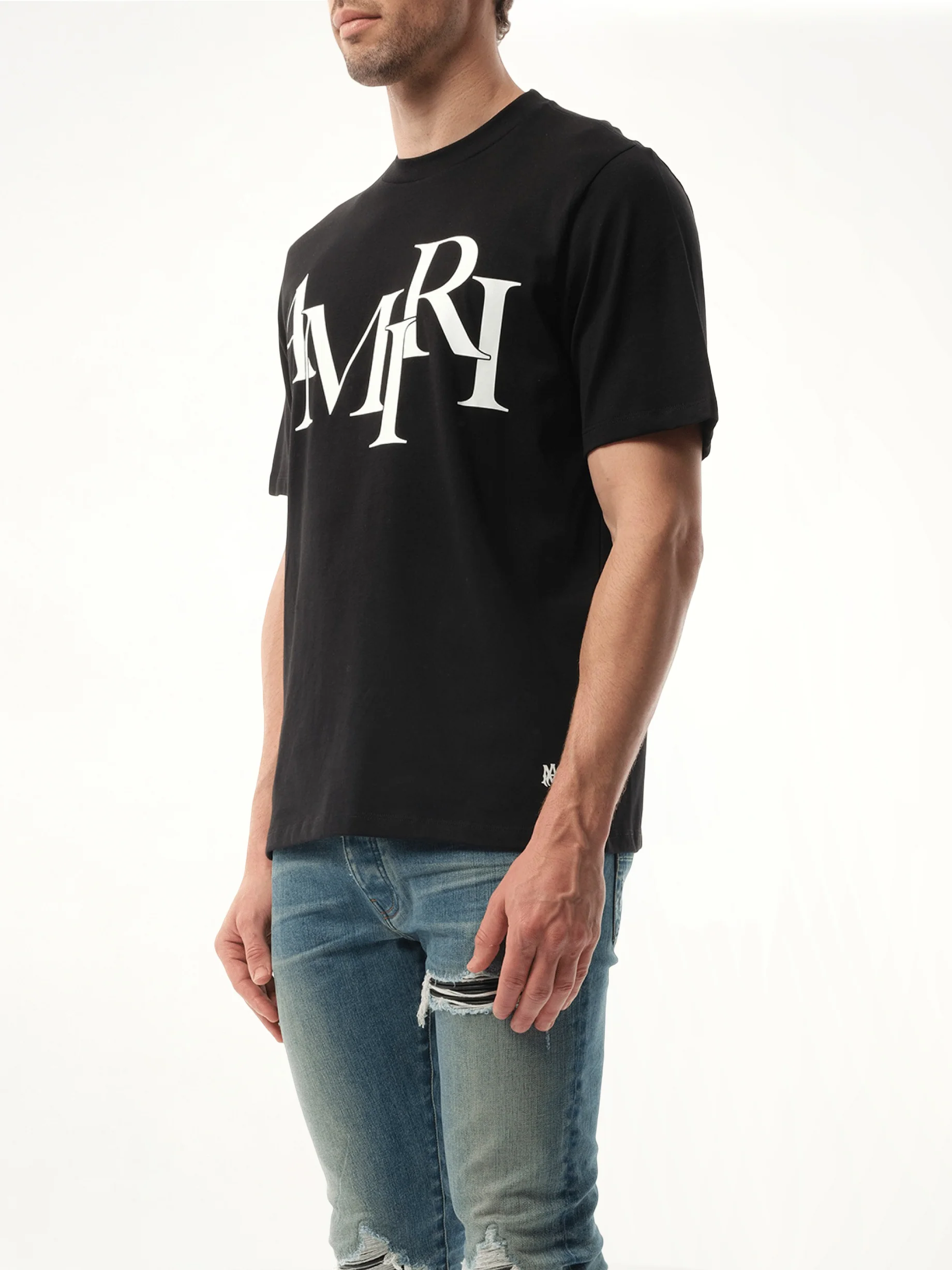 Amiri Staggered Logo T-Shirt in Black - Image 5